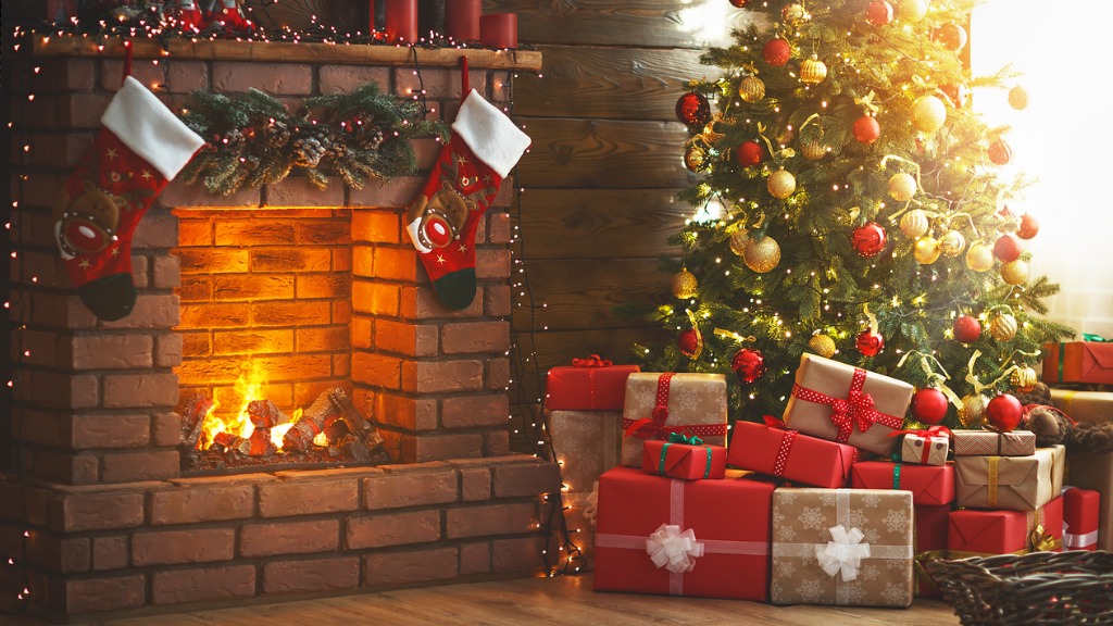 Interior christmas magic glowing tree fireplace gifts picture id873180722